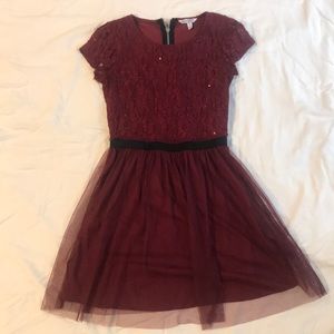 red tool and sequin short sleeved party dress.